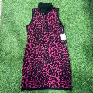 Ladies sleeveless turtleneck sweater dress with leopard print.